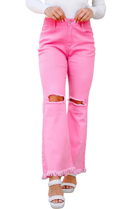 Pink vintage high waist flare leg ripped raw hem jeans