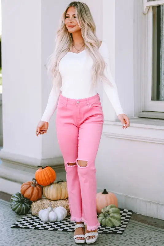 Pink vintage high waist flare leg ripped raw hem jeans