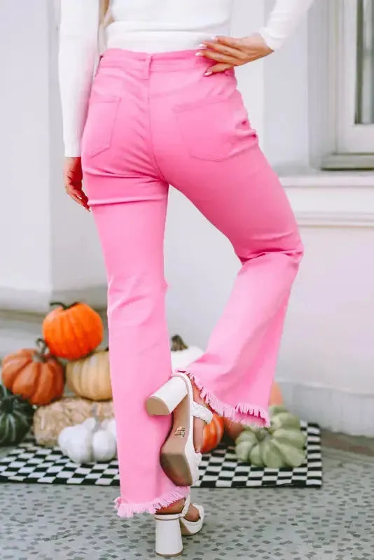 Side view of pink flare jeans showing high waist silhouette and flared leg sweep Fashionfitz UK