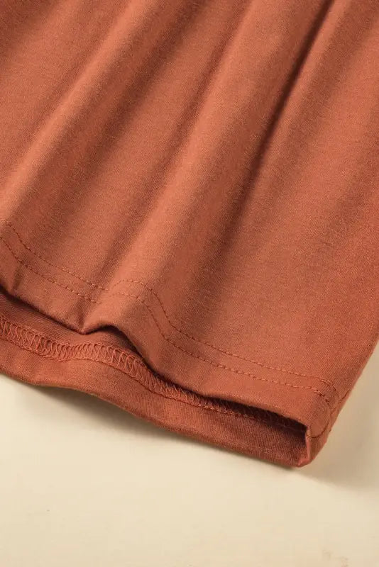 Rust-colored waffle ruffle plus mini dress with visible hem stitching for a relax relax look