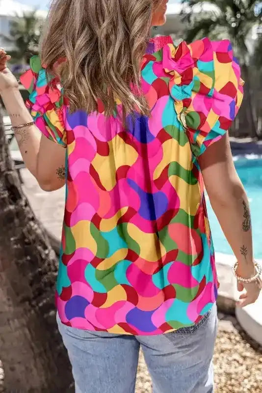 Back view of Multicolour Abstract Ruffle Sleeve Blouse showing smocked round neckline and relaxed silhouette — Fashionfitz