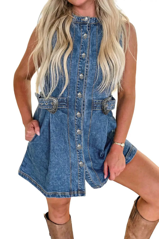 Studio shot of Western Belt Sleeveless Denim Dress with silver buckle accents and front buttons, ideal denim mini dress for summer styling.