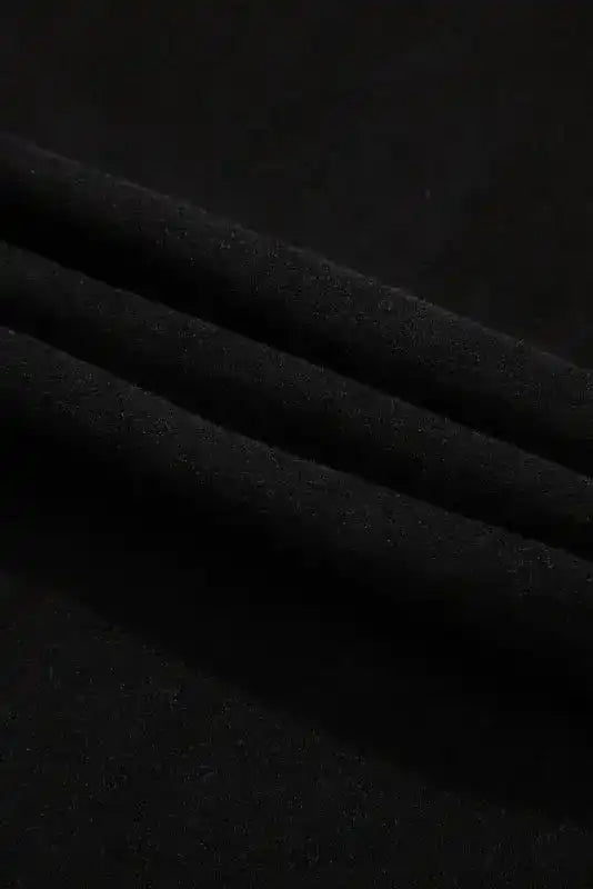 Detailed view of fleece fabric texture from the Western Print Long Sleeve Top, ideal for cold weather comfort.