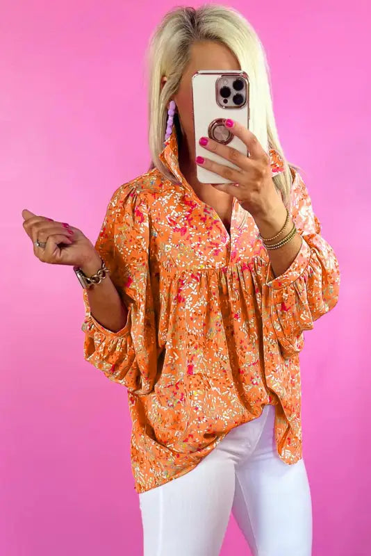 Whimsical print babydoll blouse