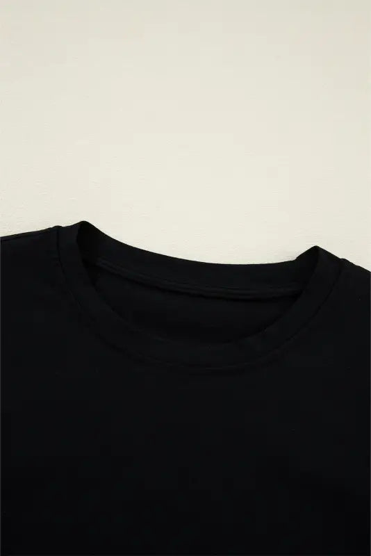 Black crew neck collar of the comfortable whimsical wave blouse, relax relax