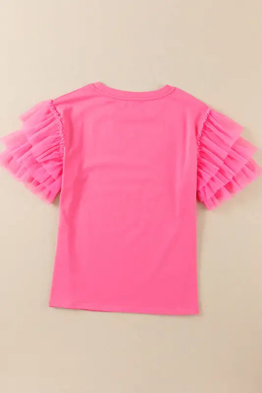 Whimsical wave blouse: bright pink t-shirt with ruffled tulle sleeves for a relax relax style