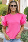 Whimsical wave blouse: bright pink top with ruffled tulle sleeves for a fun, relaxed style