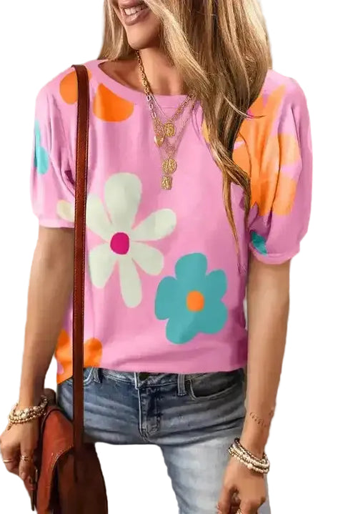 Women's floral bubble sleeve tee in pink, apricot, and black – puff sleeves, round neckline, summer fashion.