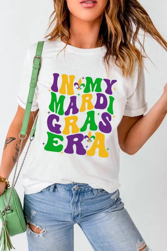 White casual plain crew neck t-shirt with colorful ’in my mardi gras era’ text design