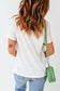 Woman in crew neck t-shirt, jeans, green handbag – white casual plain crew neck t-shirt