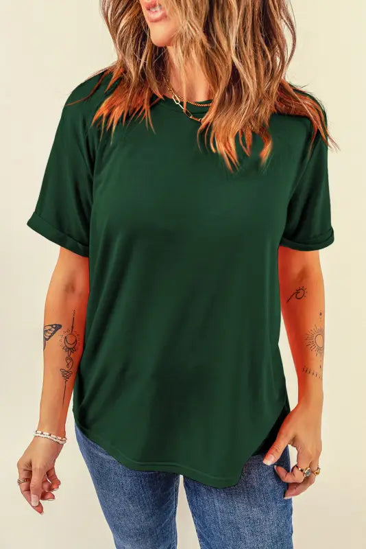 Dark green short-sleeved crew neck t-shirt with arm tattoos, relaxed casual style