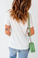 Woman with long wavy brown hair in white casual plain crew neck t-shirt, viewed from behind