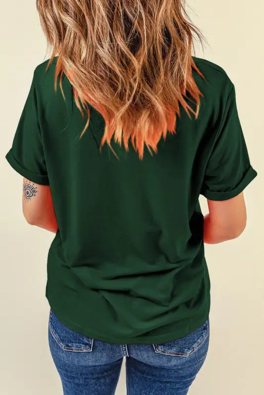 White casual crew neck t-shirt on a person with dyed blonde and orange hair