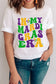 White crew neck t-shirt with ’in my mardi gras era’ text in colorful design and fleur-de-lis symbols