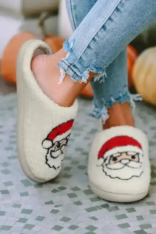 Side view of White Christmas Santa Claus Slippers showing soft fleece texture and non-slip sole, ideal for holiday comfort and warmth.