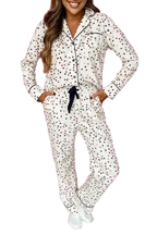 White Star Panel Pyjama Set for women featuring red and black star print, long sleeves, and contrast piping. Ideal for cosy nights in.