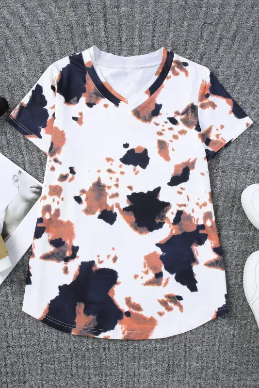 White cow pattern print short sleeve v neck t shirt: relax in style with abstract cow design