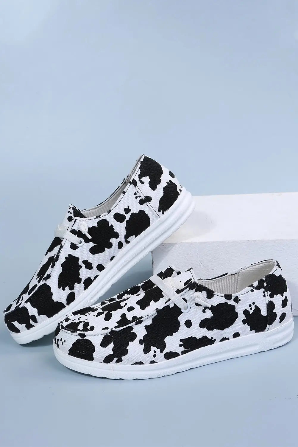 White cow print lace up round toe flat sneakers - flats