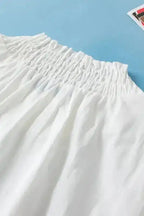 Smocked neckline detail White Embroidered Smocked Neck Puff Sleeve Blouse - Fashionfitz