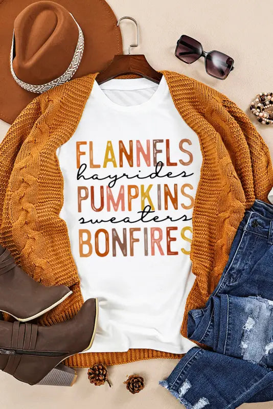 White flannels hayrides pumpkins sweaters bonfires graphic tee