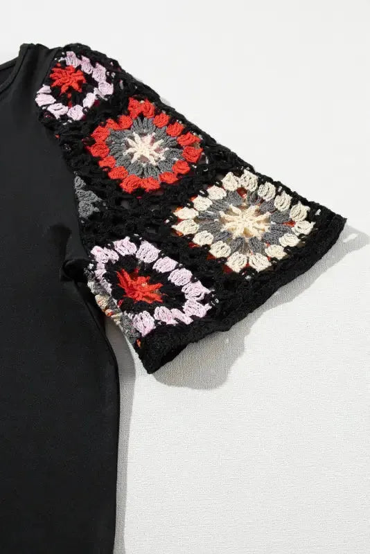 Close-up on the sleeve of Black Floral Crochet Short Sleeve Top - Fashionfitz