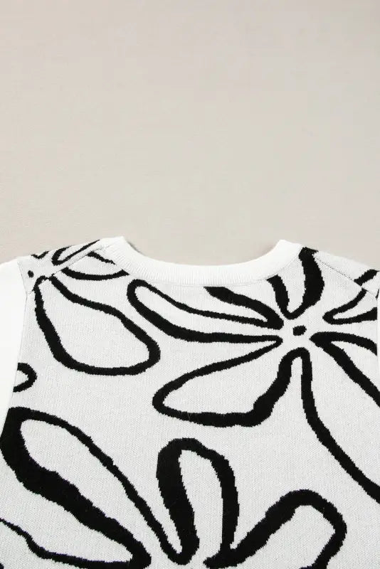 White floral knitted top - button sides sleeveless