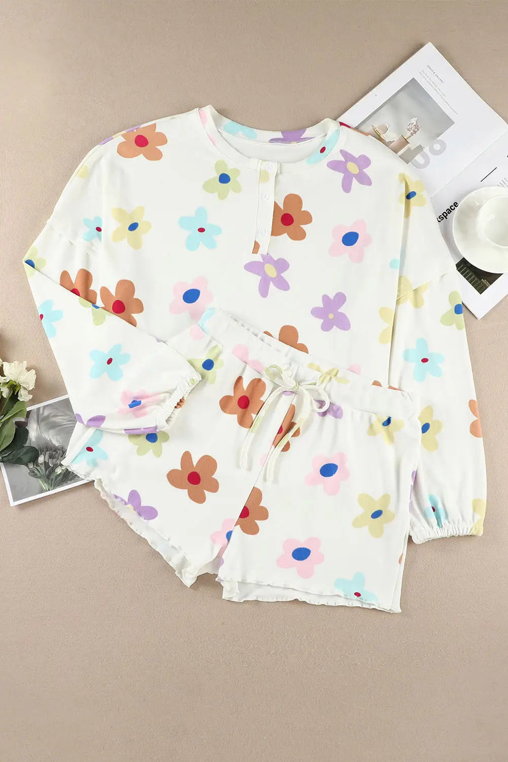 White floral long sleeve henley top and drawstring shorts