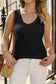 Black textured tank top paired with white pants, gold accessories - white flowy tunic top