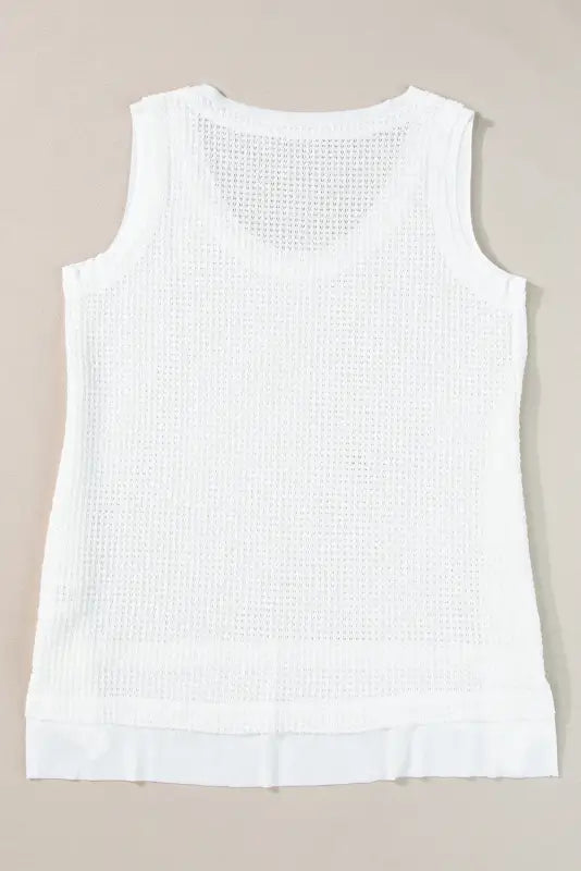 White flowy tunic tank top: relax relax in a white sleeveless knit with scoop neckline