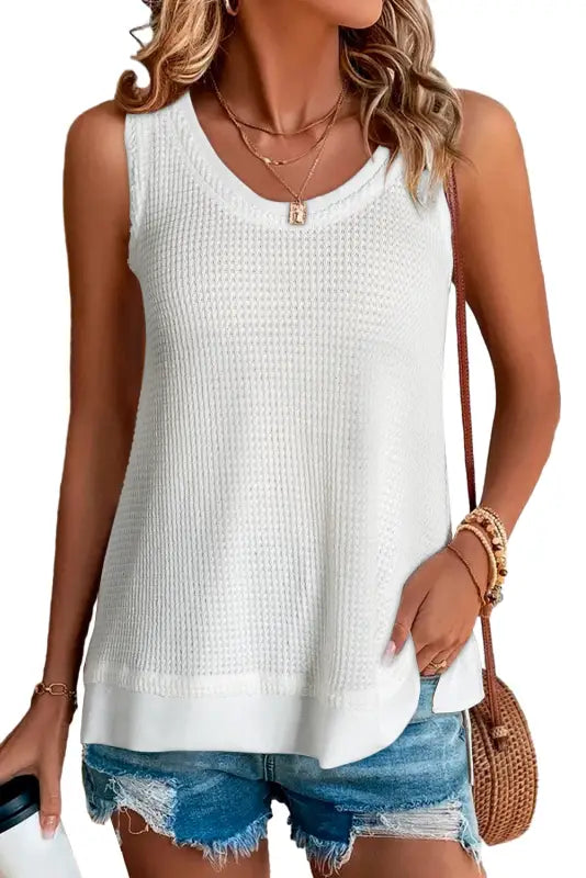 White flowy tunic - relax relax with this sleeveless knit top featuring a scoop neckline