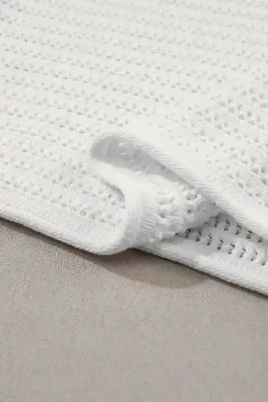 Hem detail of White Knit Cap Sleeve Tee highlighting the fine crochet finish and rolled edge for a clean, casual look.