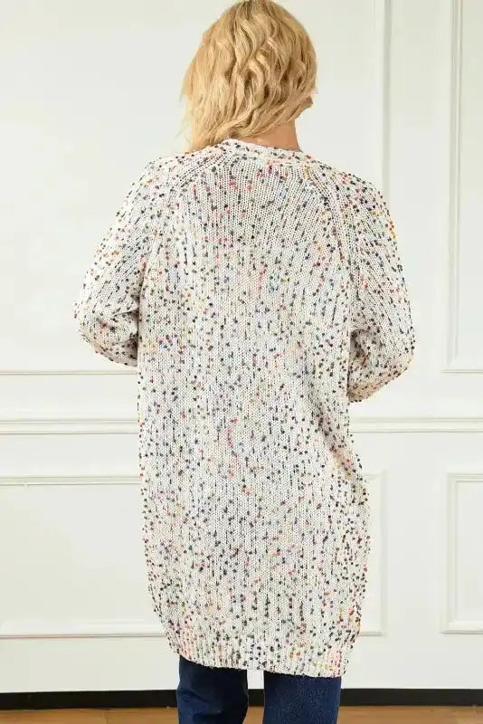 Back view of New In White Pilling Detail Patterned Sleeve Sweater cardigan showing relaxed fit and colorful speckled knit texture.