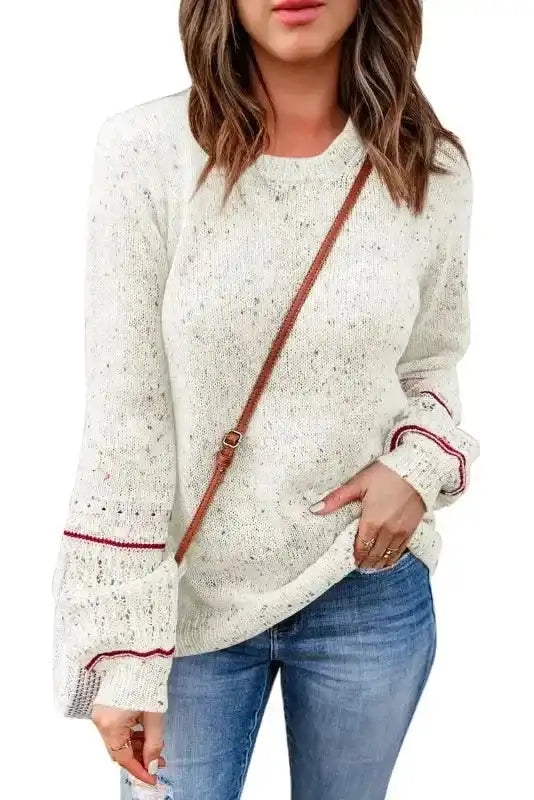 Front view of New In White Pilling Detail Patterned Sleeve Sweater with textured knit and red trim, perfect for versatile styling.