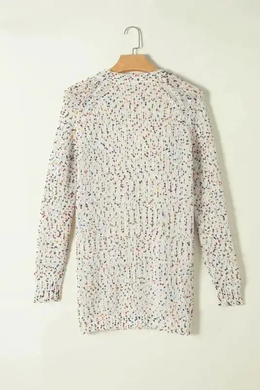 Back flat lay of New In White Pilling Detail Patterned Sleeve Sweater cardigan on hanger, displaying full length and knit texture.