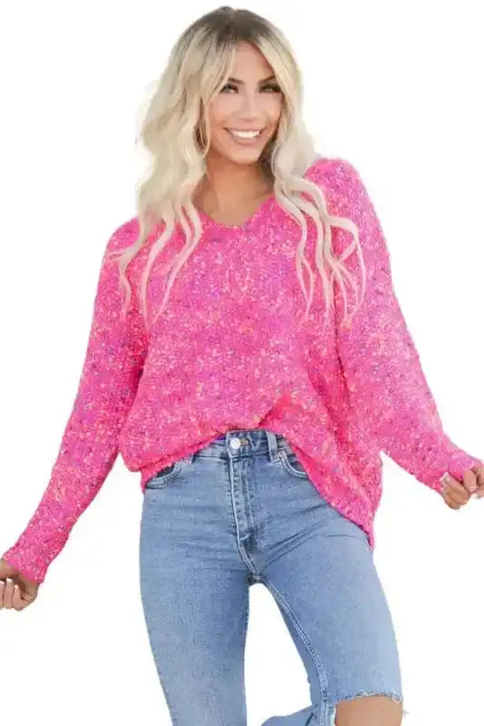 Isolated view of pink Pilling Detail Patterned Sleeve Sweater on model, highlighting its colorful knit and casual chic appeal.