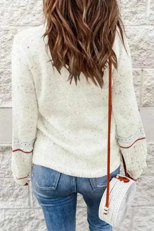 Back view of White Pilling Detail Patterned Sleeve Sweater showing textured knit and subtle red sleeve accents, ideal for casual winter outfits.