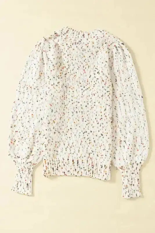 Back flat lay of White Pilling Detail Patterned Sleeve Sweater highlighting textured knit and colorful speckled pattern.