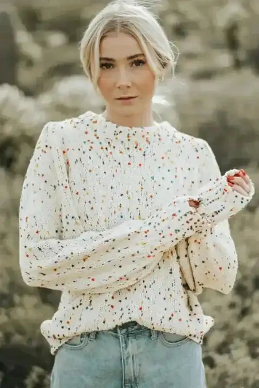 Front view of White Pilling Detail Patterned Sleeve Sweater with multicolor speckles and balloon sleeves, styled for a cozy winter vibe.