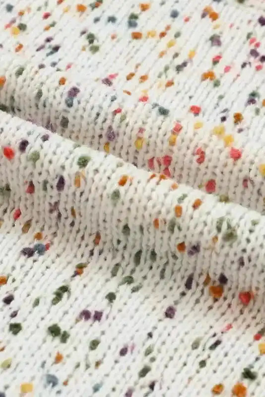Fabric detail of White Pilling Detail Patterned Sleeve Sweater showing soft knit with multicolor speckles for cozy winter wear.