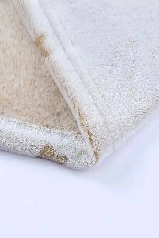 Close-up of a soft fabric showcasing the quality of the white plush lounge set from Fashionfitz