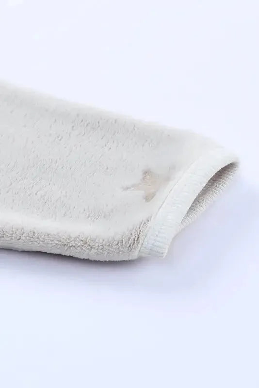 Close-up of White Plush Lounge Set from Fashionfitz showcasing soft fabric and comfortable design