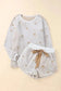 Fashionfitz white plush lounge set featuring a cozy top with star patterns and matching shorts