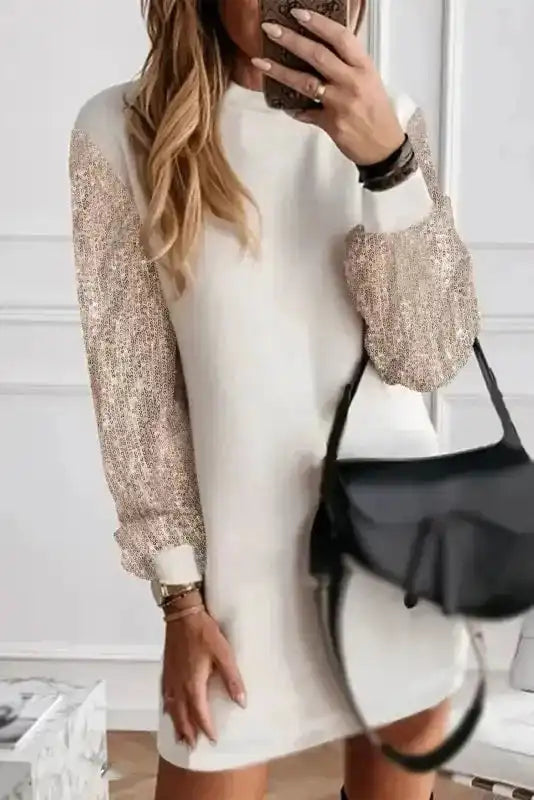 Chic White Sequin Puff Sleeve Dress in mini shift style with sparkling sleeves, ideal for holiday or party wear.