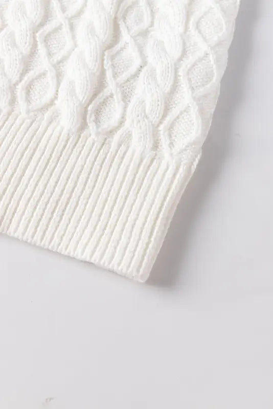 White turtle neck short sleeve cable knit ruffled sweater