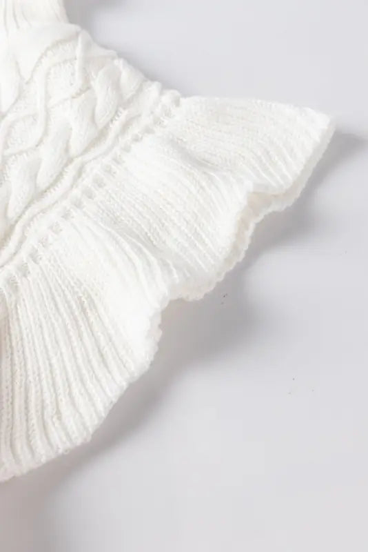 White turtle neck short sleeve cable knit ruffled sweater