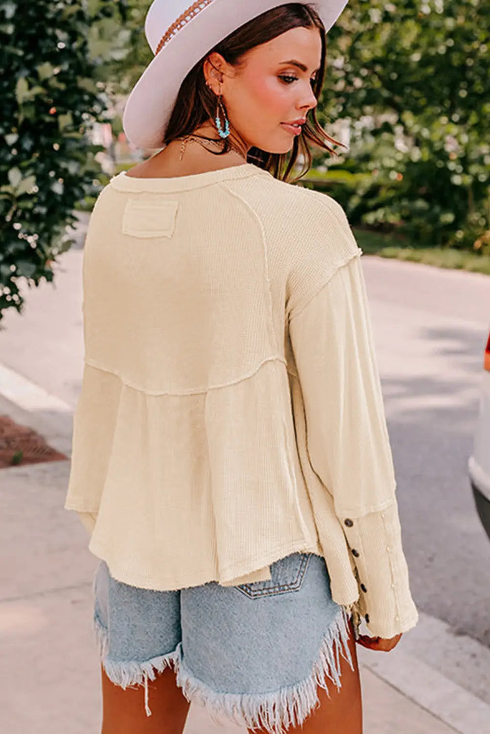 White waffle knit button detail exposed seam flowy top - tops