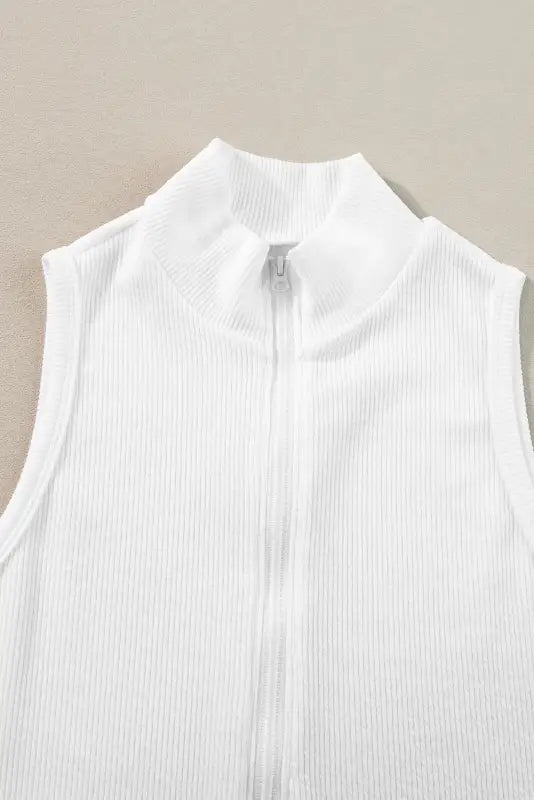 White sleeveless ribbed top with zipper and mock neck, perfect relax wear