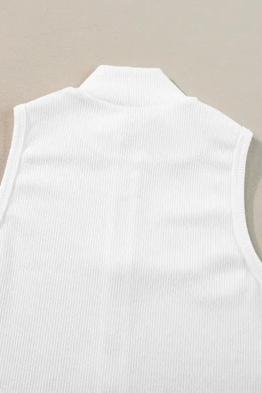 White mock neck ribbed sleeveless turtleneck top; chilled, relaxed, relax relax style