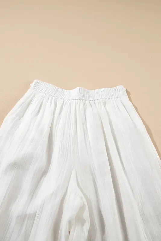 Wide leg linen pants in white casual tie waist