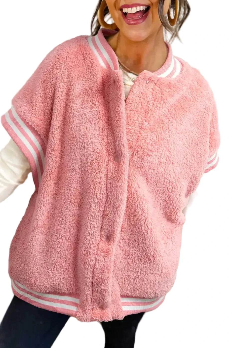 Model wearing varsity pink plush vest with zip front and high collar